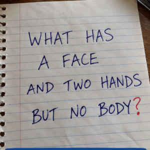 What has a face and two hands but no body riddle
