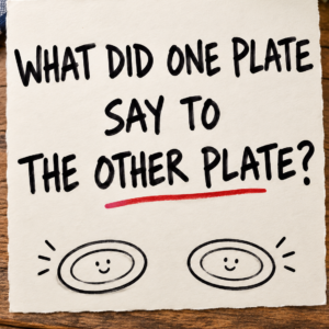 Two plates joke handwritten on cream paper